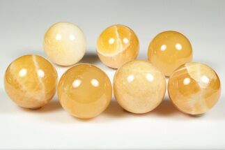 1.6" Polished, Orange Calcite Spheres
