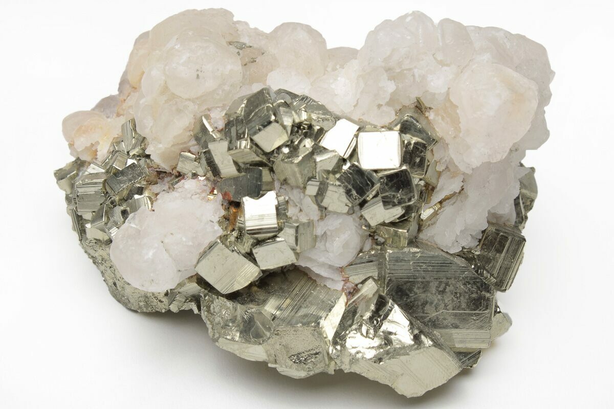 6.3 Fluorescent Calcite Crystals on Clear Quartz - Peru (#213585